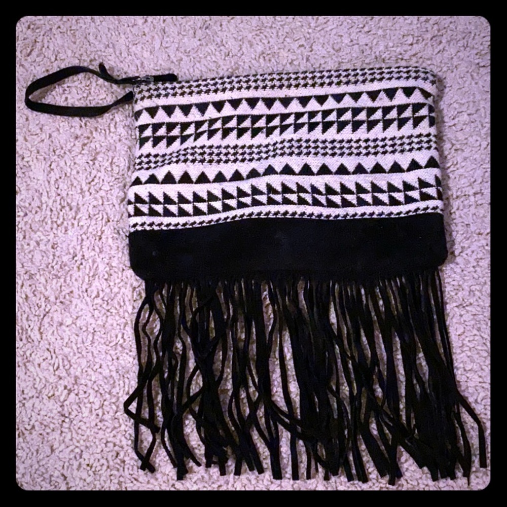 AMERICAN EAGLE clutch with fringe.